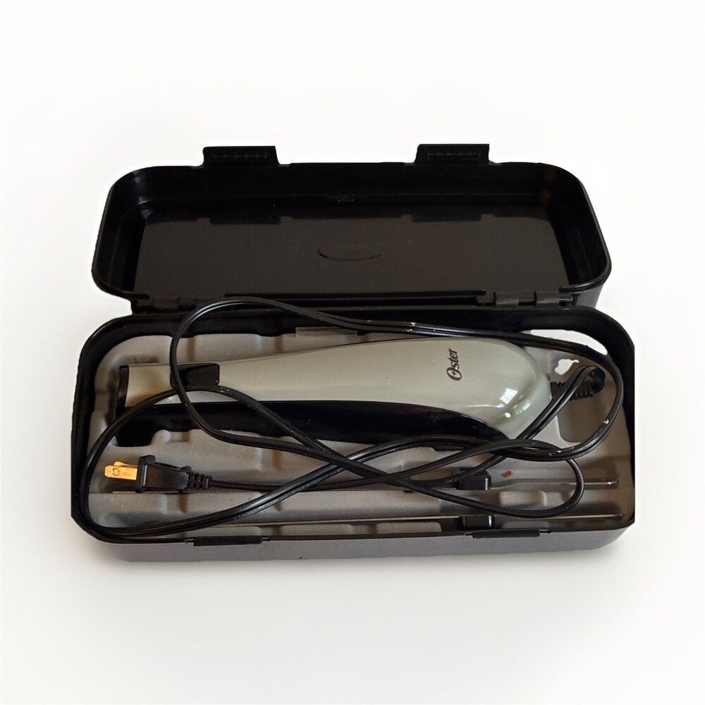 Oster Electric Knife Black/White w/ Storage Case, 7" Blade, 120V, 60" Cord